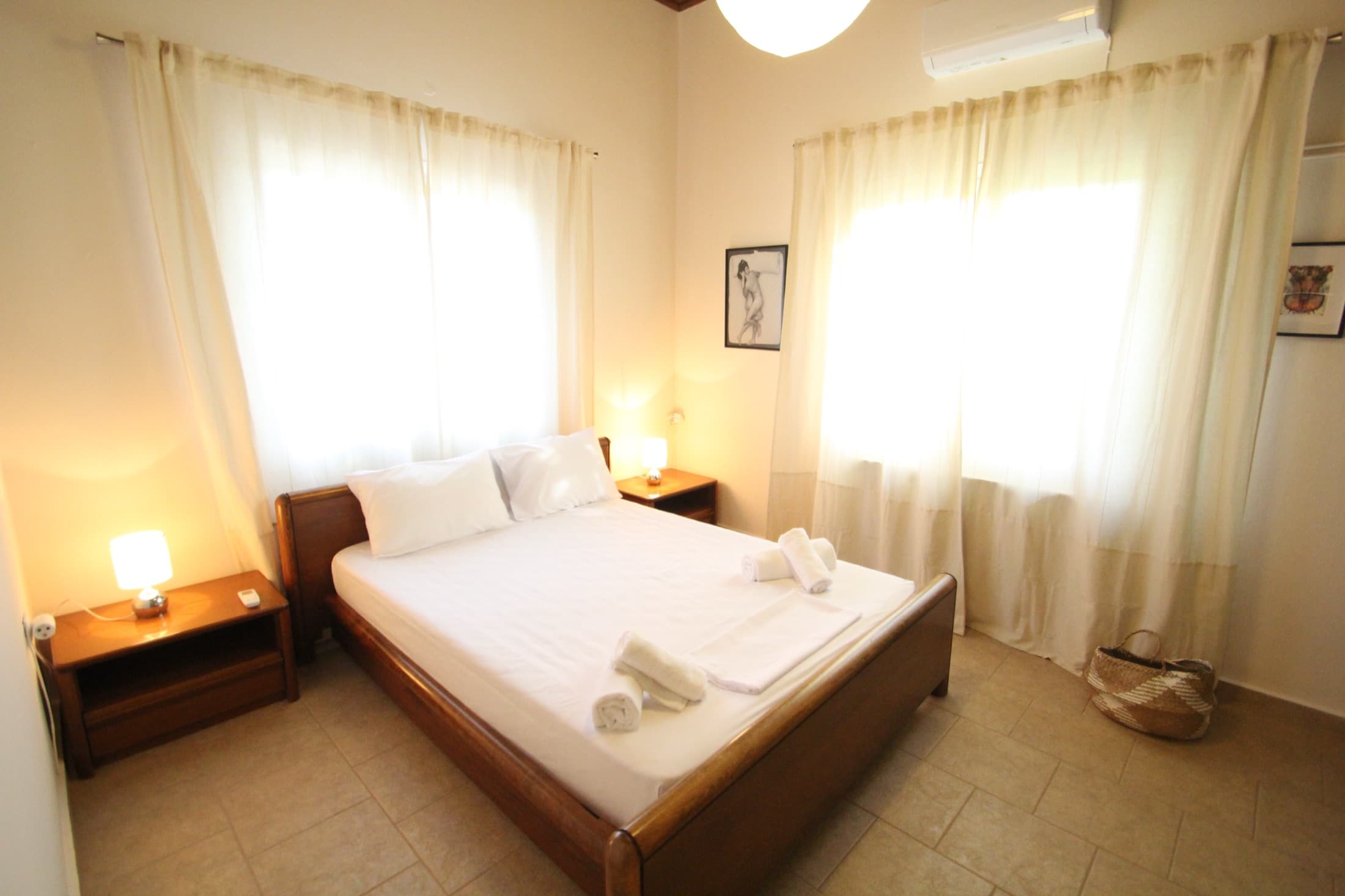 Light-filled double bedroom at Fistiki House