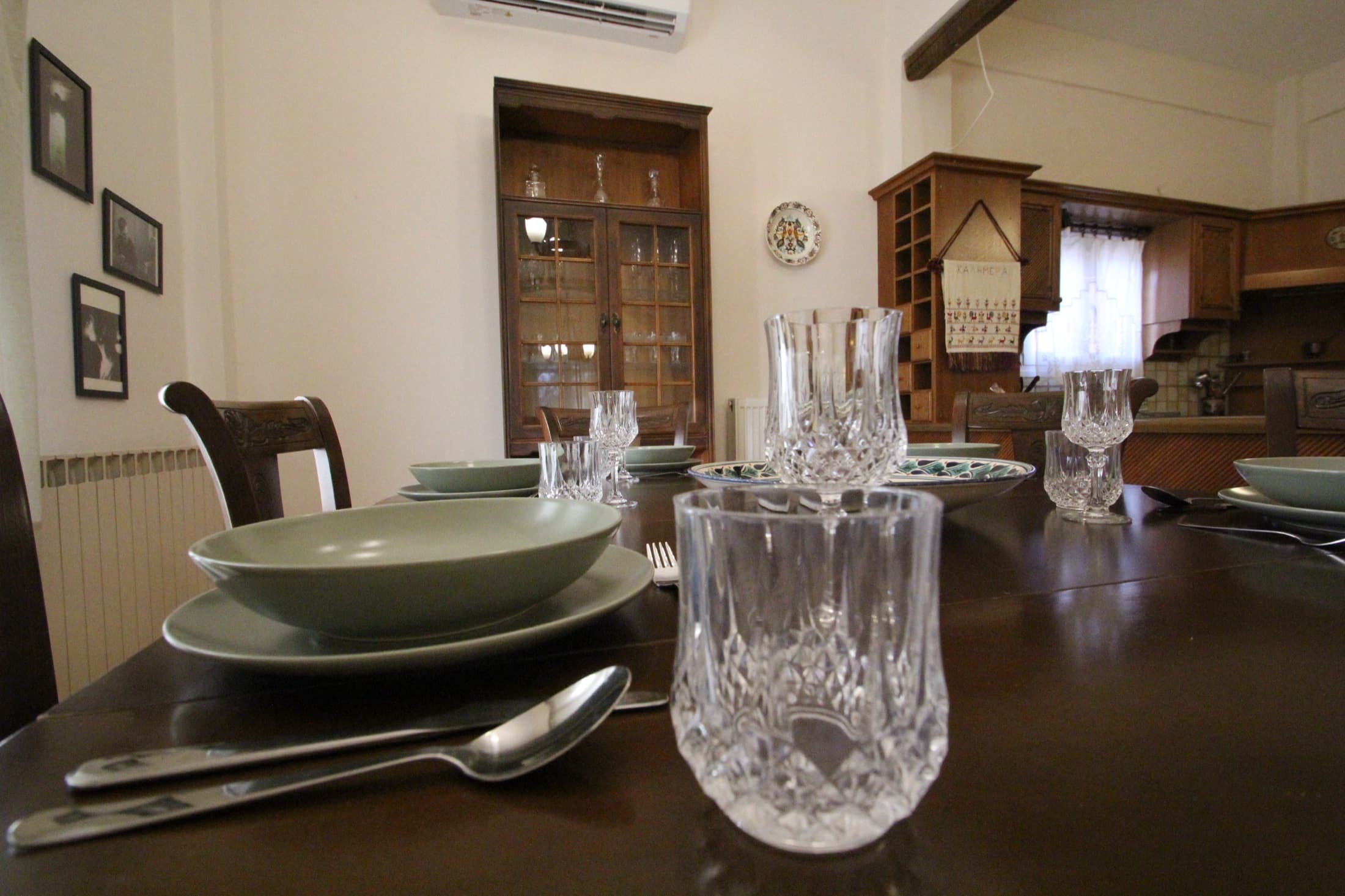 Dining table laid for a meal at Fistiki House